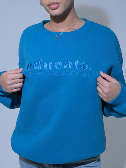 Blue Embroidered EDUCATE Crewneck