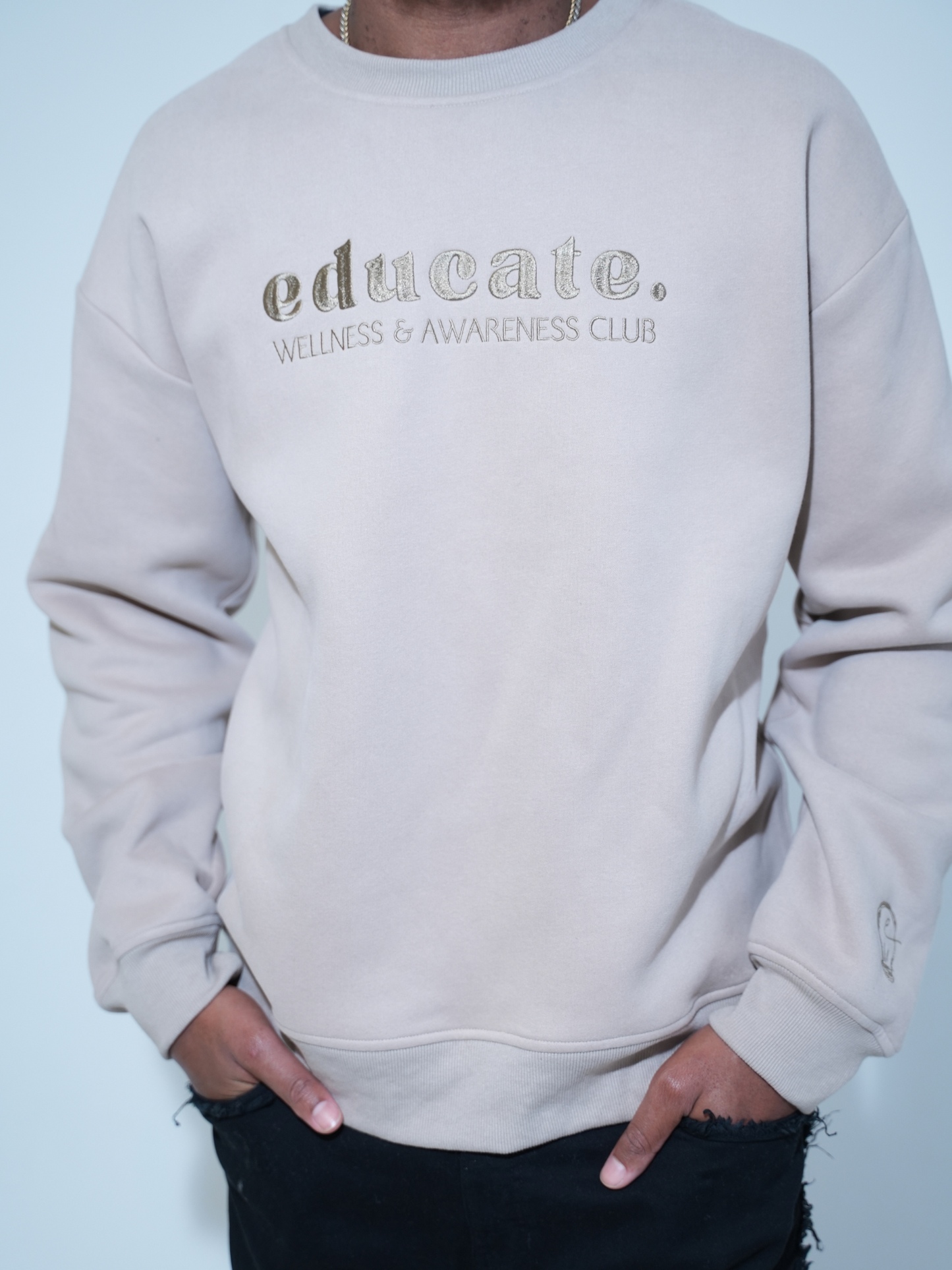 Beige Embroidered EDUCATE Crewneck